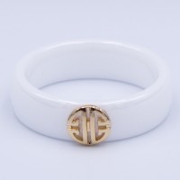 Кільце сталь №572 16.17.18.19.20.21.22р керамічна основа Tory Burch Style з круглим позолоченим медальйоном-логотипом медзолото купити оптом