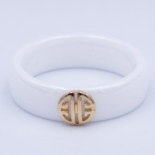Кільце сталь №572 16.17.18.19.20.21.22р керамічна основа Tory Burch Style з круглим позолоченим медальйоном-логотипом медзолото купити оптом