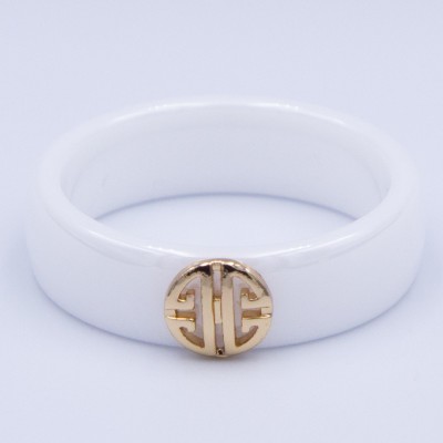 Кільце сталь №572 16.17.18.19.20.21.22р керамічна основа Tory Burch Style з круглим позолоченим медальйоном-логотипом медзолото купити оптом