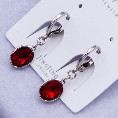 Сережки Xuping№751А 9х5 мм з червоним каменем Swarovski купити недорого медзолото від виробника біжутерика